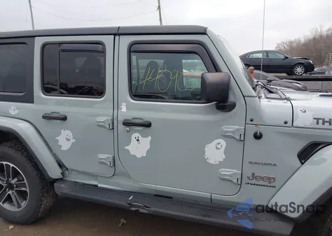 2023 Jeep Wrangler 4-Door Sahara 4X4 from USA, damaged, VIN 1C4HJXEN9PW601623